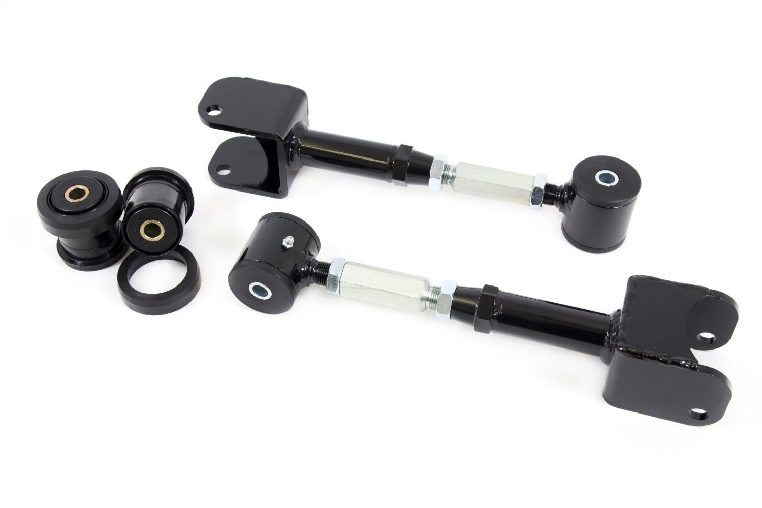 On-car adjustable arms feature poly bushings on the chassis side and include UMI P/N 3000 for the ax