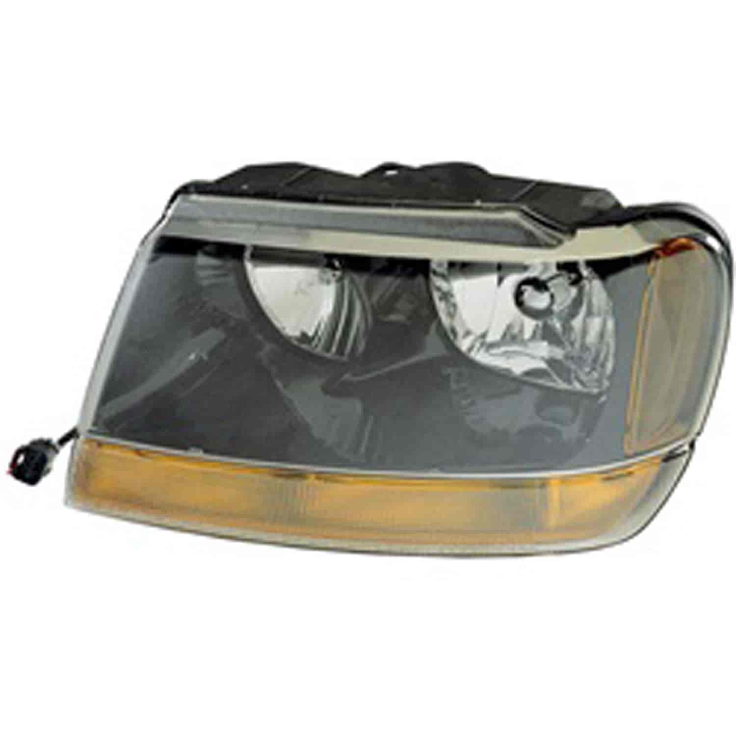 Replacement headlight assembly from Omix-ADA, Fits left side on 99-04 Jeep Grand Cherokee WJ Laredo.