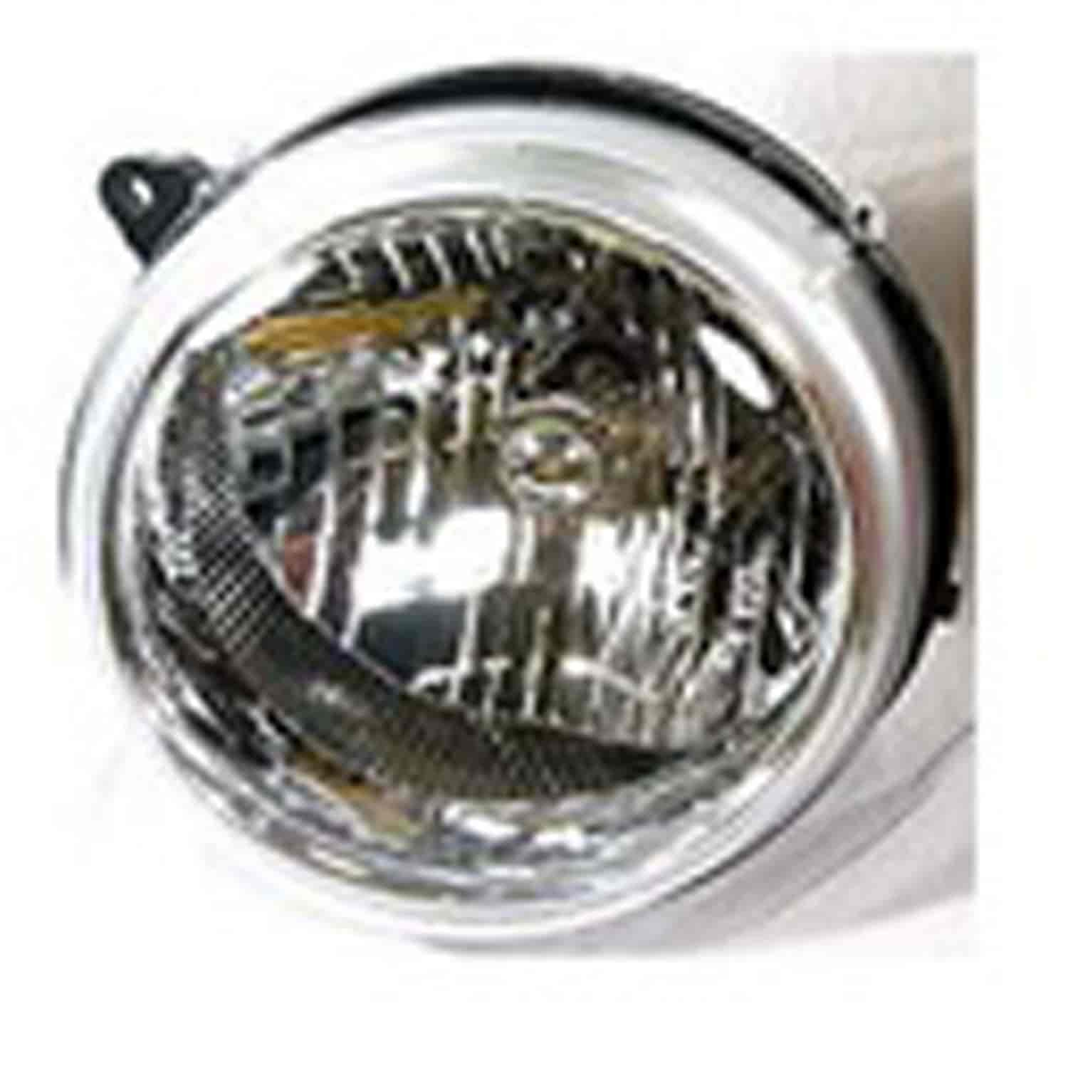Replacement headlight assembly from Omix-ADA, Fits right side on 2002 Jeep Liberty KJ built before November 05 2002.