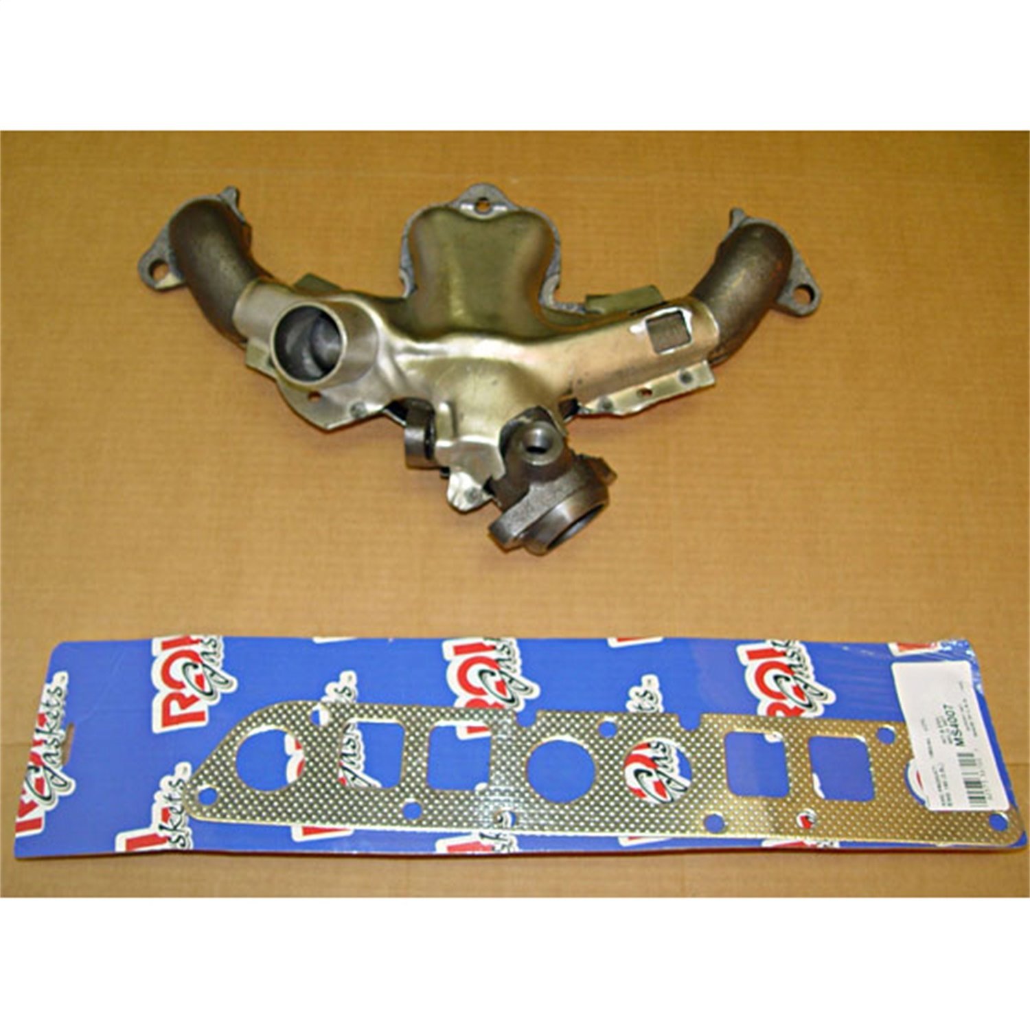 Replacement exhaust manifold kit from Omix-ADA, Fits 84-90 Jeep models with a 2.5 liter engine.