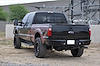 1999-Up Ford F-250/350 HoneyBadger Rear Bumper with lockable storage space and backup sensor cutout - image 1