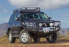 3415150B Winch Bumper w/ Fit Kit Fits Select Toyota Land Cruiser [Black Finish] - image 1