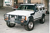 3450010B Winch Bumper w/ Fit Kit Fits Select Jeep Cherokee [Black Finish] - image 1