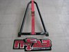 Universal Bed Mounted Tire Carrier With Red Strap - image 2