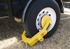 *USED - Trimax Adjustable Wheel Lock Fits Most 10"-18" Wheels - image 1