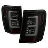 Version 3 Light Bar LED Tail Lights for 1999-2004 Jeep Grand Cherokee [Black Smoke] - image 1