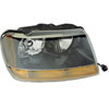 Replacement headlight assembly from Omix-ADA, Fits right side on 99-04 Jeep Grand Cherokee WJ Laredos. - image 1