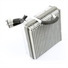 This A/C evaporator core from Omix-ADA fits 99-01 Jeep Grand Cherokees with a 4.0L or 4.7L engine and Auto Temp Control. - image 1