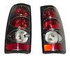 PERFORMANCE T.L. LENS HSNG SET OF 2 CARBON FIBER SILVERADO 99-02 SIERRA FLEETSIDE 99-07 - image 1