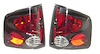 PERFORMANCE T.L. LENS HSNG SET CARBON FIBER S10 P/U/SONOMA 94-04 - image 1
