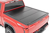 47514551 Hard Low Profile Bed Cover, 5'7" Bed, Cargo Mgmt, Fits Select Toyota Tundra - image 1