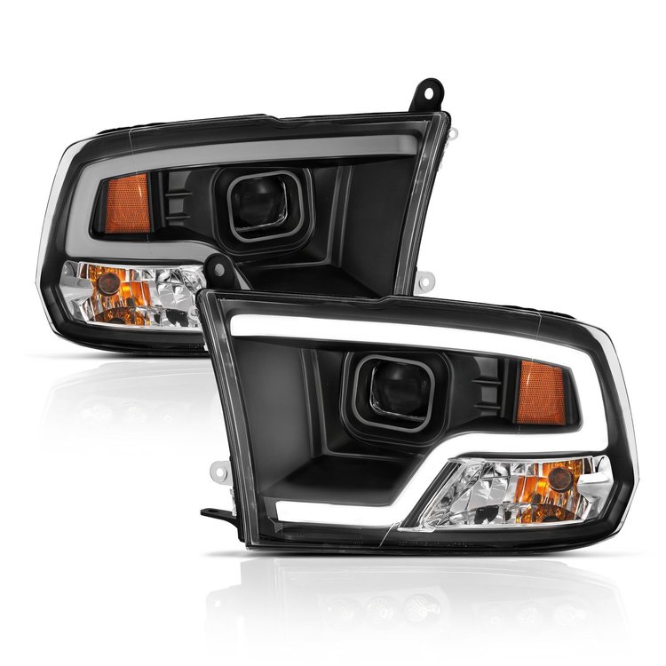 111404 Projector Black Housing Halogen Headlights Fits Select Dodge/Ram 1500, 2500, 3500 Trucks [Plank Style, Clear Lens]