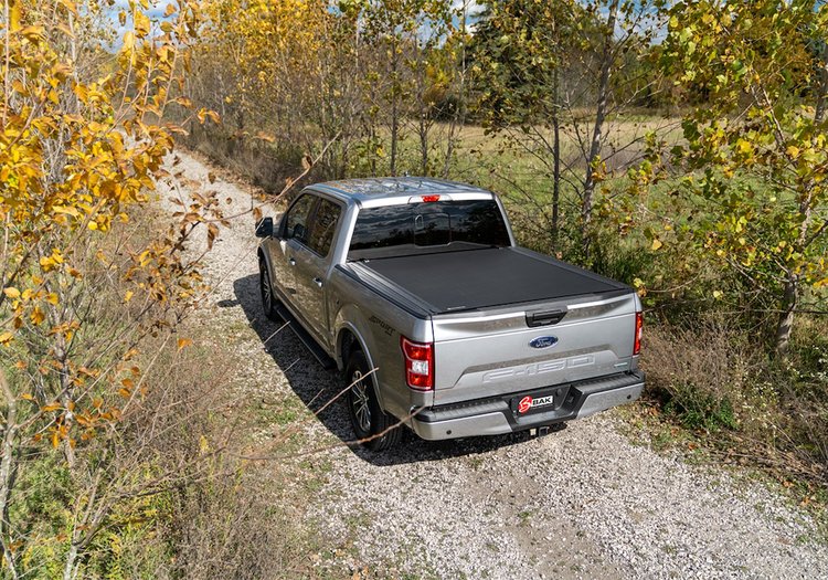 80134 Revolver X4s for Fits Select GM Silverado/Sierra 2500/3500 HD 8.2 ft. Bed, Roll-Up Hard Cover Style [Black Finish]
