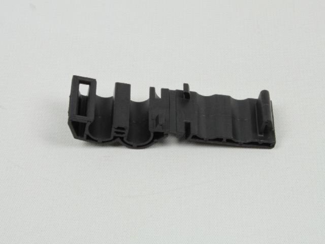 RETAINER OIL COOLER TUBE