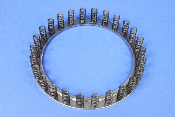 SPRING UNDER DRIVE PISTON