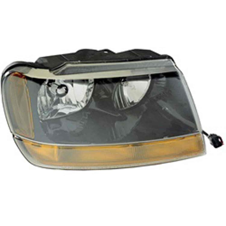Replacement headlight assembly from Omix-ADA, Fits right side on 99-04 Jeep Grand Cherokee WJ Laredos.