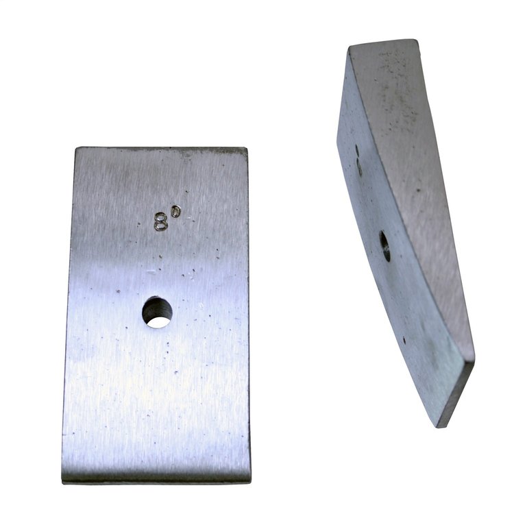 This pair of 8 degree rear leaf spring shims from Omix-ADA fits 76-86 Jeep CJs and 87-95 Wrangler YJ .