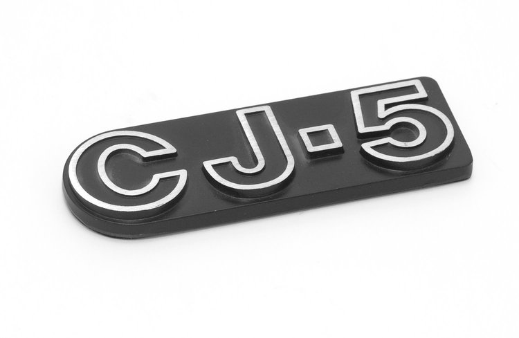 This officially licensed CJ5 emblem from MOPAR attaches to your Jeep with double-backed adhesive tape. for 76-83 Jeep CJ5.