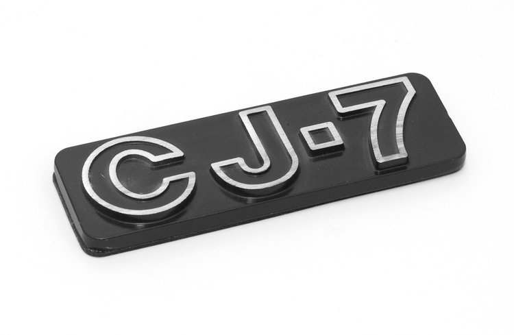 This officially licensed CJ7 emblem from MOPAR attaches to your Jeep with double-backed adhesive tape. for 76-86 Jeep CJ7.