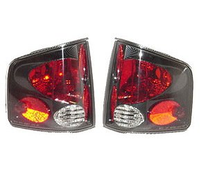 PERFORMANCE T.L. LENS HSNG SET CARBON FIBER S10 P/U/SONOMA 94-04
