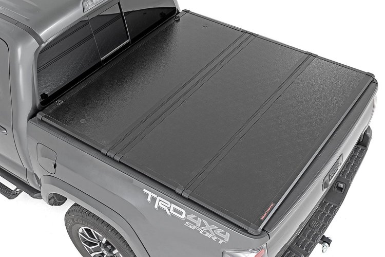 45716501A Toyota Hard Tri-Fold Bed Cover (16-21 Tacoma - 5' Bed w/Cargo Mgmt)