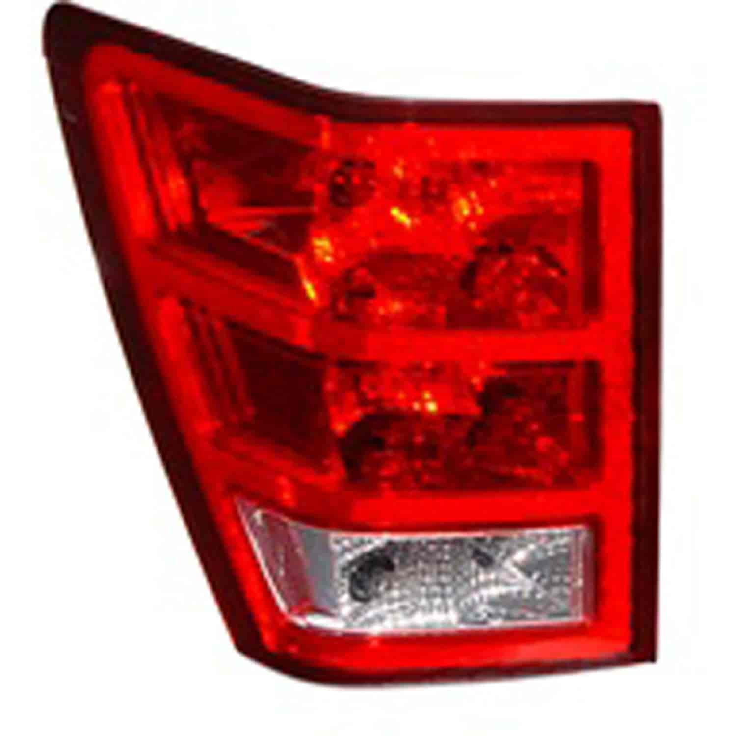 Replacement tail light assembly from Omix-ADA, Fits left