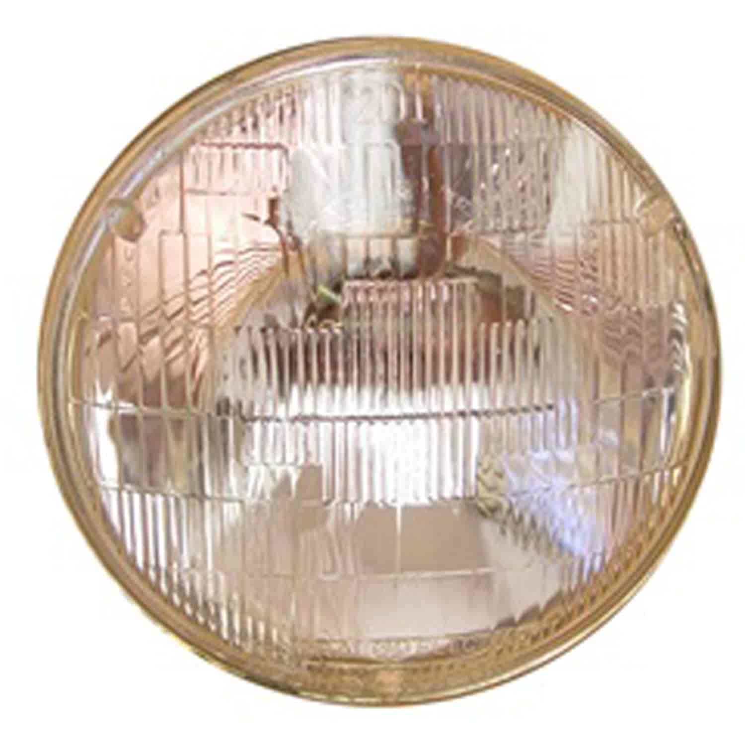 This 6-volt sealed beam 7 inch headlight from Omix-ADA fits 46-64 Willys and Jeep CJ models.